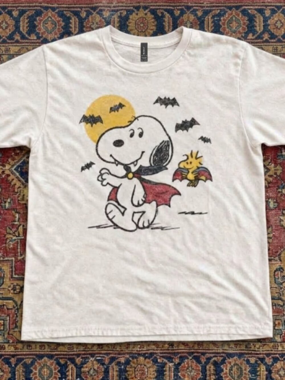 White Halloween tee with Snoopy and Woodstock in vampire